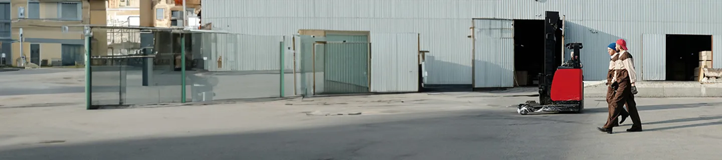 banner showcasing warehouse with tall shelves stacked with boxes, containers, and packaged goods